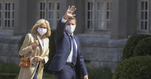 PARIS, FRANCE - JUNE 28: French President Emmanuel Macron (R) accompanied by his wife (L) leave after voting for the second round of municipal elections today in Paris, France on June 28, 2020. ( Francois Pauletto - Anadolu Agency )
