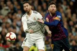MADRID, SPAIN - MARCH 02: Lionel Messi (R) of Barcelona in action against Sergio Ramos (L) of Real Madrid during the La Liga week 26 soccer match between Real Madrid and Barcelona at Santiago Bernabeu Stadium in Madrid, Spain on March 02, 2019. ( Burak Akbulut - Anadolu Agency )