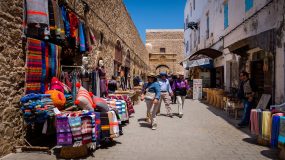 Morocco. Essaouria. City and port on the Atlantic coast of Morocco, with its medina registered as a UNESCO World Heritage Site. Shopping street and craftsmen along the inner ramparts of the medina. Tourists. (Photo by: Andia/Universal Images Group via Getty Images)